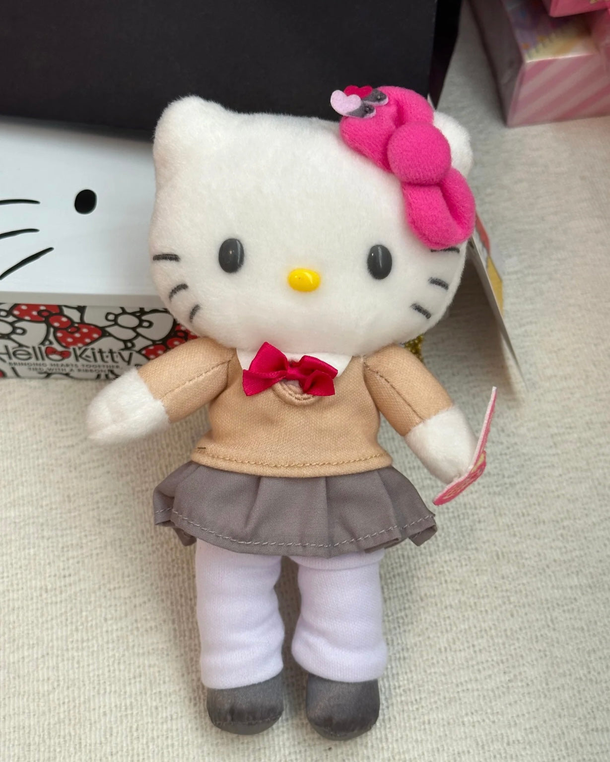 sanrio-hello-kitty-50th-anniversary-museum-exhibition-limited-uniform-long-leg-mascot-holder-keychain