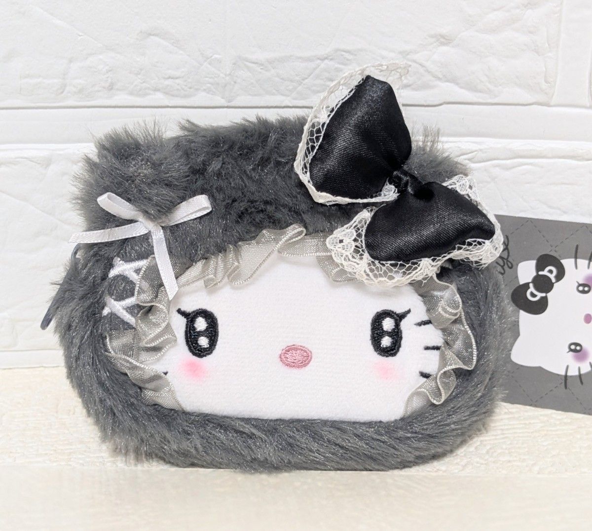 sanrio-hello-kitty-black-fluffy-mini-face-pouch